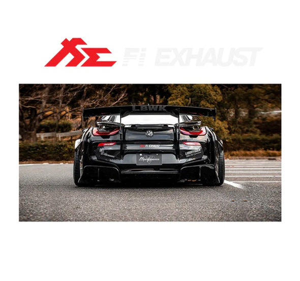 A sticker of a black car with red and white accents, featuring the Fi EXHAUST brand logo, applied on a car's surface.