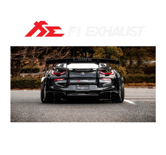 A sticker of a black car with red and white accents, featuring the Fi EXHAUST brand logo, applied on a car's surface.